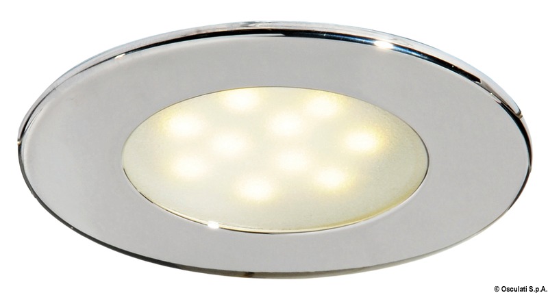 Corpo in acciaio inox. Lente in vetro satinato.Doppio sistema di fissaggio: con viti nascoste o con molle interne inox.